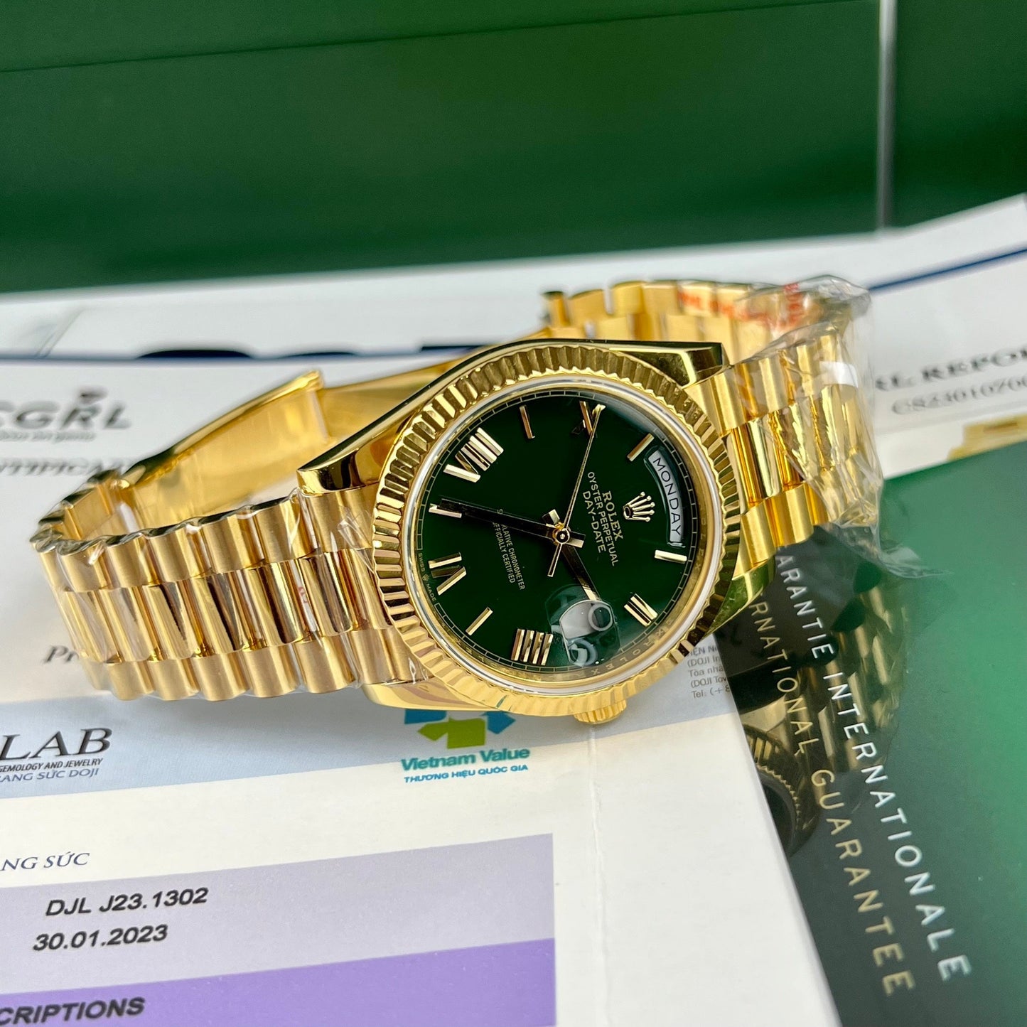 Rolex DayDate 40mm 228238 coated 18k Yellow Oro President quadrante verde 130 gram